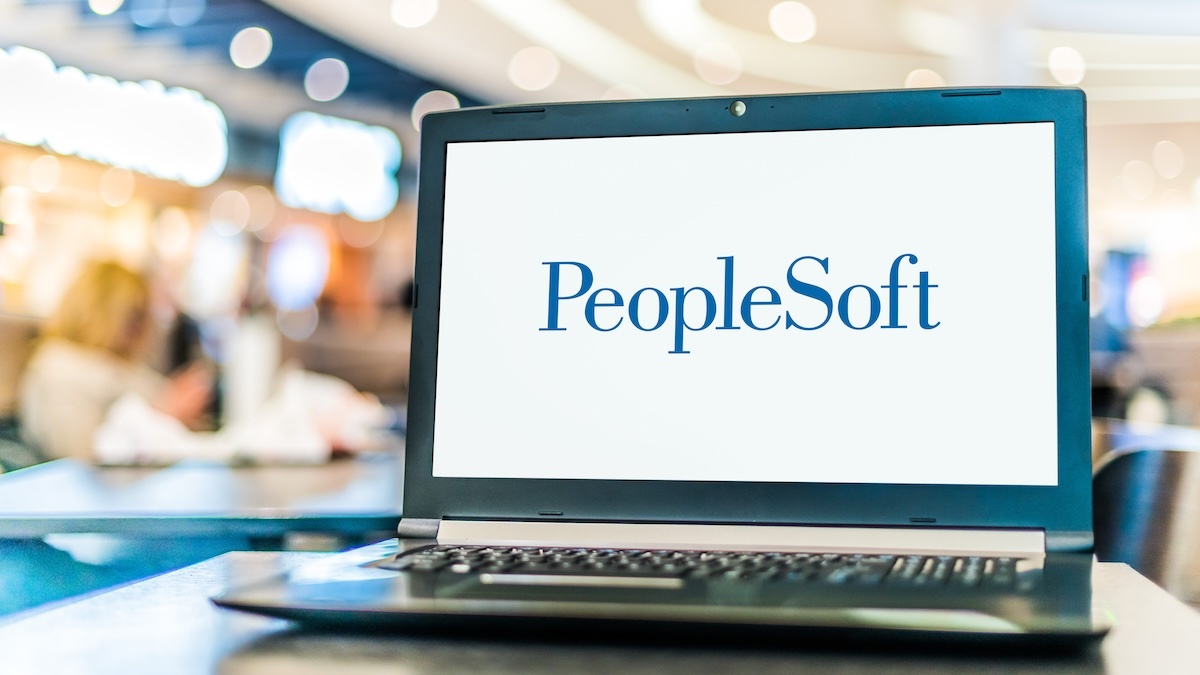 Laptop screen showing the PeopleSoft wordmark.