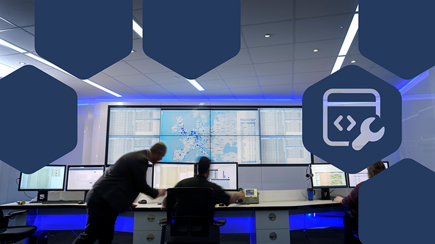 Microsoft Security Blog featured image for Unmasking EvilTokens, an operations room with a video wall.